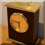 D039. Brass and wood Classics Central Missouri State University quartz clock. 6”h - $20